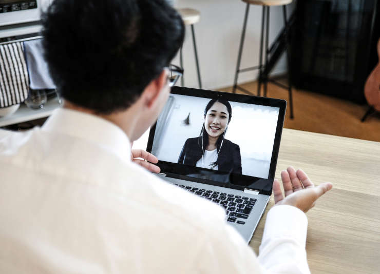 young_man_takes_online_CEU_course_on_laptop-desktop